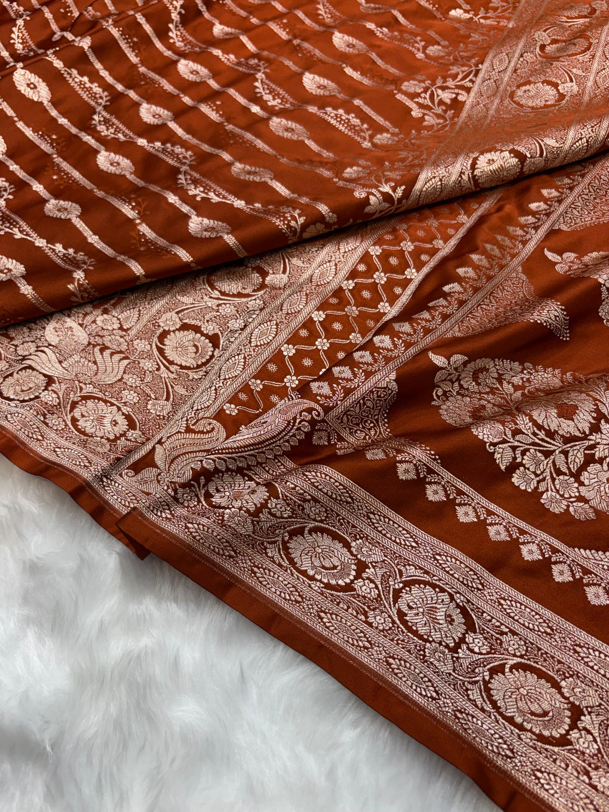 Burnt Copper Shades Floral Jaal with Vertical Stripe Motifs Pattern Mashru Silk Saree