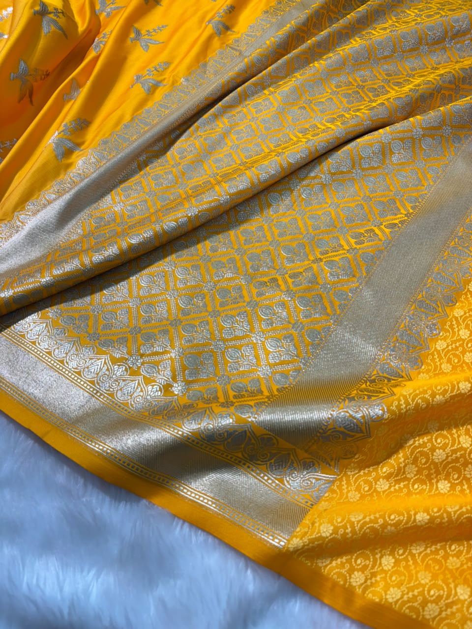 Yellow Shade Floral Motifs Mashru Silk Saree