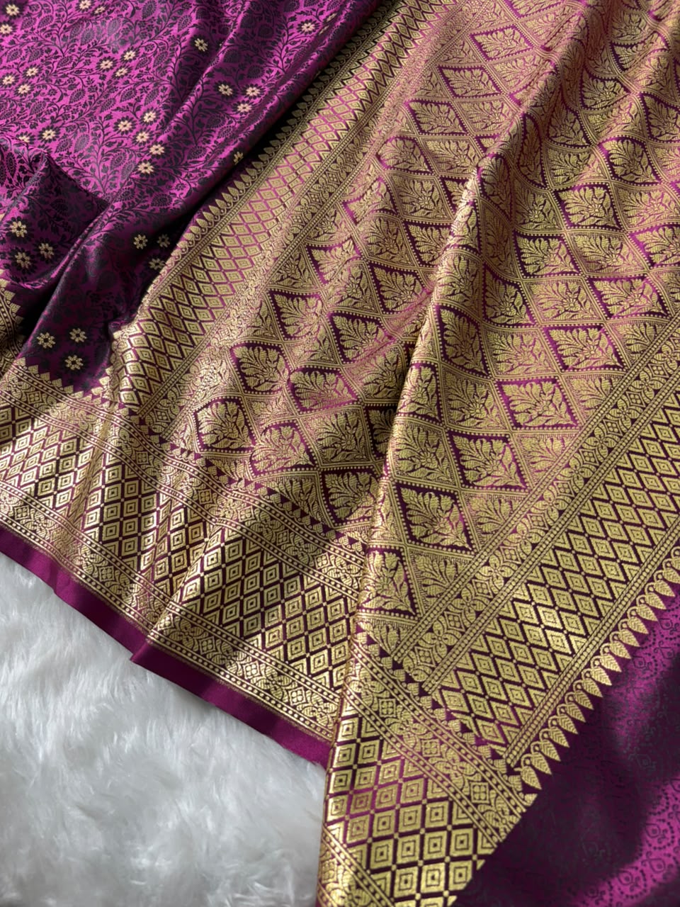 Banarasi Floral Motifs with Tanchoi Pattern Mashru Silk Saree in Wine Shades
