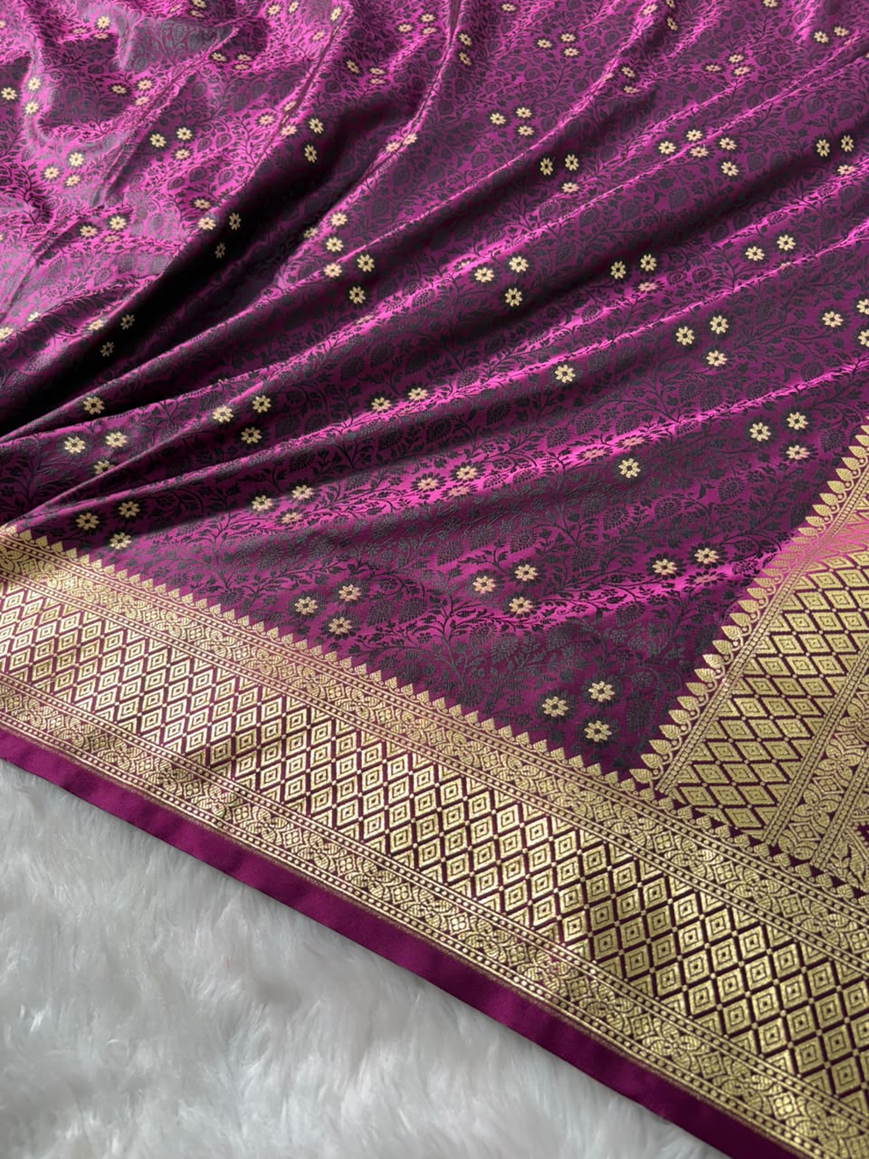 Banarasi Floral Motifs with Tanchoi Pattern Mashru Silk Saree in Wine Shades
